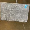 A concrete stone on an easel. This stone is 17x11.5 inches and