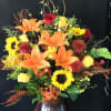 A deluxe fall arrangement in a vase