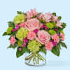 Overflowing with blushing pink and refreshing green blooms, the Pinch Me Bouquet