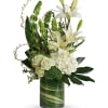 Snow white blooms and eye-catching greens create this beautiful botanical gift that&#039;s