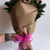 bouquets are never identical, but will have the same overall theme, wrapping