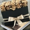 Elegant box filled with approximately 20 gold roses, offering a luxurious and