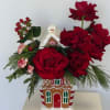A Gingerbread house keepsake with a variation of Red Flowers in it.