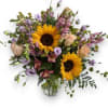 A modern twist on an autumn design, sunflowers accented by pink and