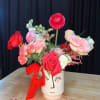 Add a touch of elegance to your celebration with a small floral