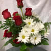 This simple and beautiful arrangement grabs attention with the Red Roses partnered