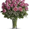 Blushing pink roses and delicate white limonium add up to a feminine