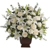 A touching tribute. This elegant, large sympathy arrangement is an impressive mix