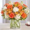The sweet citrus shades in our charming bouquet bring your sentiments to