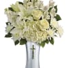 A shining tribute to a life well lived, this pure white bouquet