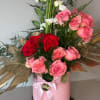 Beautiful pink and white rose floral arrangement, perfect for any occasion. With