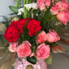 Beautiful pink and white rose floral arrangement, perfect for any occasion. With