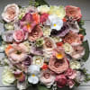 Beautiful blooming signature Blomst flower box full of fresh flowers in a
