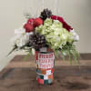 White and green hydrangea, roses berries and cones
