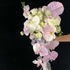 The product contains roses, phalaenopsis, gladiolus, emerald flowers, tied with ribbons