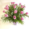 18 Lavender Roses beautifully arranged in a vase. PREMIUM includes higher end