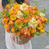 Products include sunflower, rose, green leaves. Straw basket 