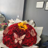 This is a bouquet of 75 roses it includes butterfly add on