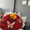 This is a bouquet of 75 roses it includes butterfly add on