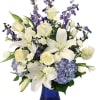 This gorgeous beauty is perfect for the season! The white roses, tulips