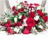 A Show stopper Wedding Bouquet! Cascading bouquet of red roses, red spray
