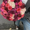Stunning bouquet full of Garden Roses, Spray Roses, and other mixed flowers
