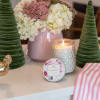 With a clear, glass hobnail textured jar and a silver lid, our