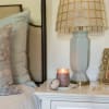 With a clear, glass hobnail textured jar and a silver lid, our