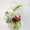 Modern, Playful and Sculptural Floral Arrangement of White Callas, White Cymbidium Orchids