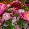 Introducing our Petite Peony Bouquet, a charming blend of elegance and seasonal