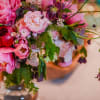 Introducing our Petite Peony Bouquet, a charming blend of elegance and seasonal