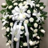 Large Standing Spray made of white roses, white oriental lilies, white chrysanthemums