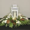 A festive centerpiece to bring some winter cheer to your holiday table!
