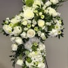 Sending love and comfort through faith with this elegant cross. White and