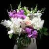 Overwhelmingly gorgeous arrangement of peonies, hydrangea, phalaenopsis, cymbidium and dendrobium orchids. 