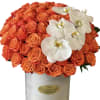 50-55 Orange roses arranged in a tall hat box and topped with