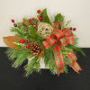 Mixed wintergreens and pine cones accented with deep red berries and a
