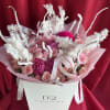 Embrace the magic of the season with this enchanting pink bouquet, where