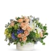 This untamed garden of green and peach is wildly chic. Beautiful and