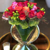 This arrangement of red roses will lift any room for the new