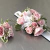 Pink spray rose corsage 

Please specify color of the bracelet 