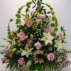 A large, full sympathy basket suited for memoral, funeral or graveside service.