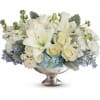 As magical and unforgettable as an elegant affair! Creamy roses and snow