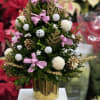 This lovely coquette hand crafted boxwood tree with the colors pink and
