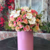 Brighten any space with our Elegant Flower Box Arrangement! Bursting with vibrant