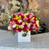 Brighten any space with our Elegant Flower Box Arrangement! Bursting with vibrant