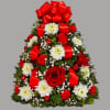 The holiday favorite that started it all! Our flower tree arrangement is