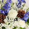 Inspired by winter&rsquo;s cool blue &amp; white landscape, our delightful arrangement delivers