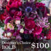 Let our designers choose the freshest flowers available in bold shades to