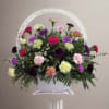 Celebrate the beauty of life with our Carnation Comfort funeral basket, a
